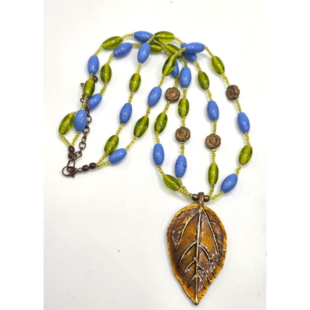 Beaded Necklace With Bronze Leaf Pendant In Blue & Green Glass Beads